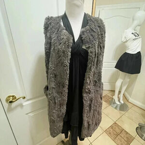 Attarid sate soft furry short sleeve cardigan with side packets.